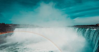 Rainbow Over Waterfall