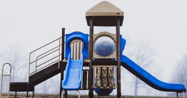 Blue And Brown Wooden Playground Set In Fog