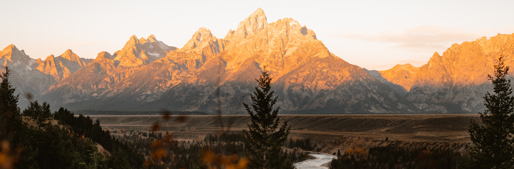 Mountains And River During Sunset