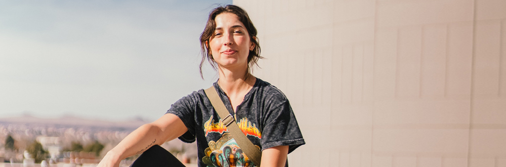 Woman With T-shirt Smiling At Camera